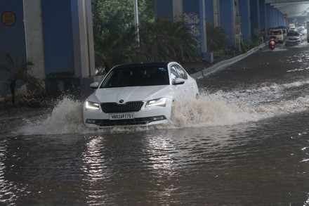 Commuters Wade Through Waterlogged Street After Editorial Stock Photo