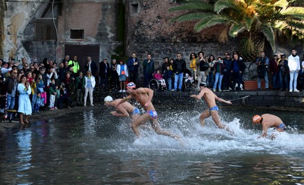 Participants Swim During San Silvestro Mare Editorial Stock Photo