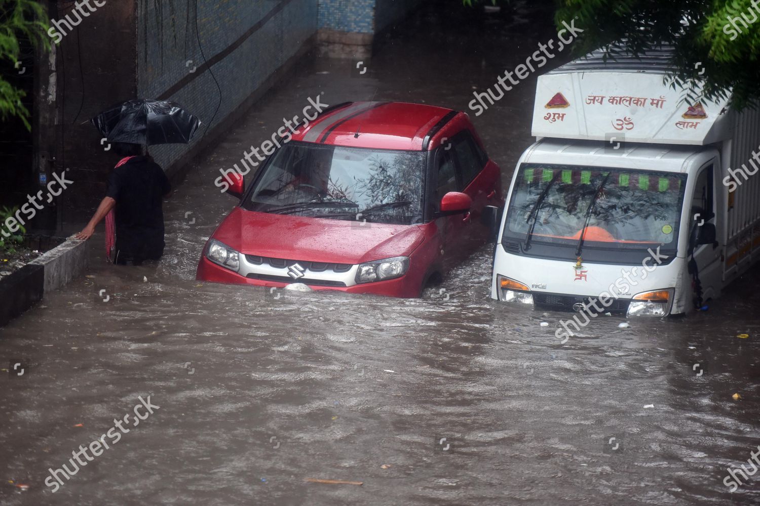 Commuters Wade Through Waterlogged Stretch Road Editorial Stock Photo