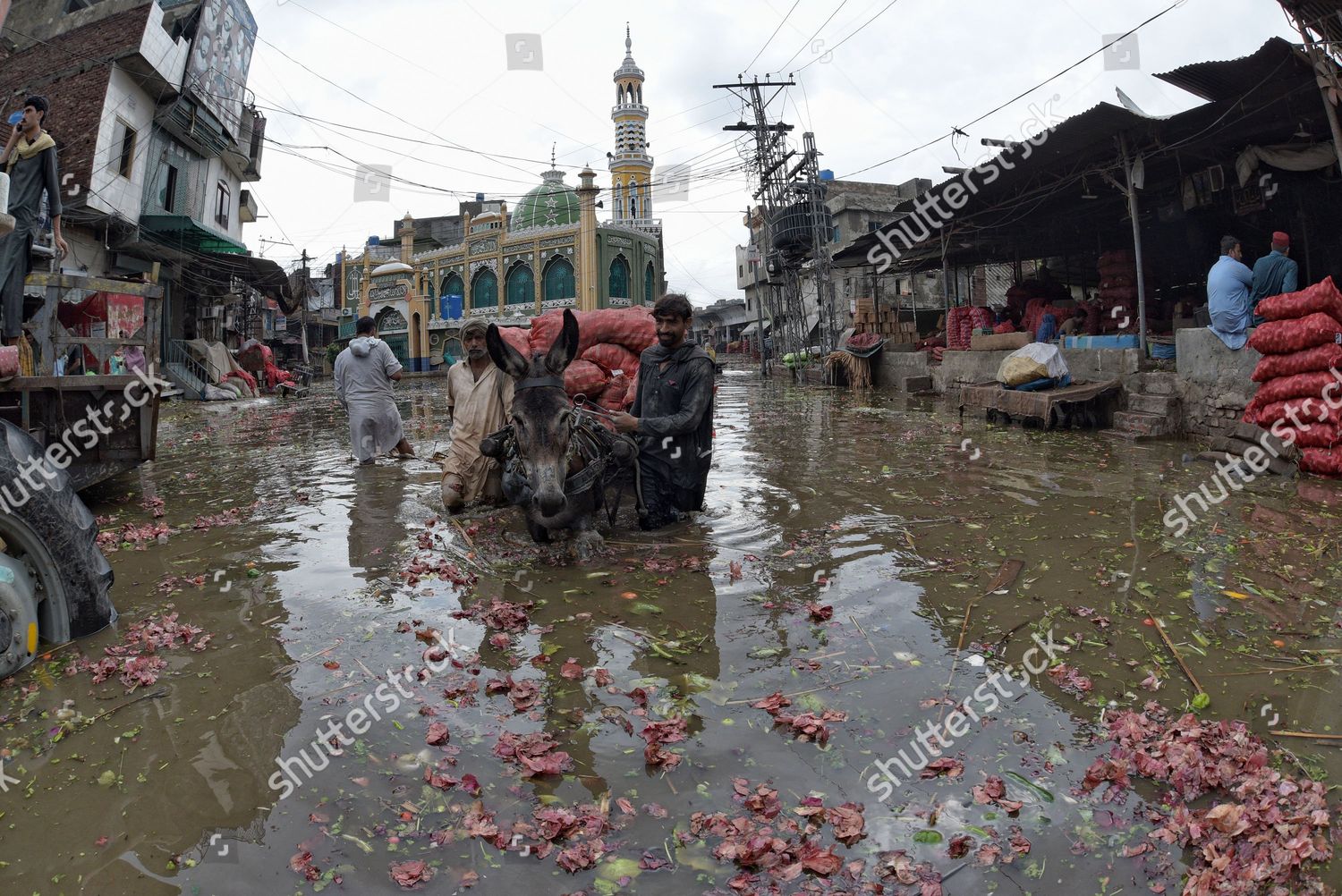 Pakistani People Wade Through Flooded Road Editorial Stock Photo