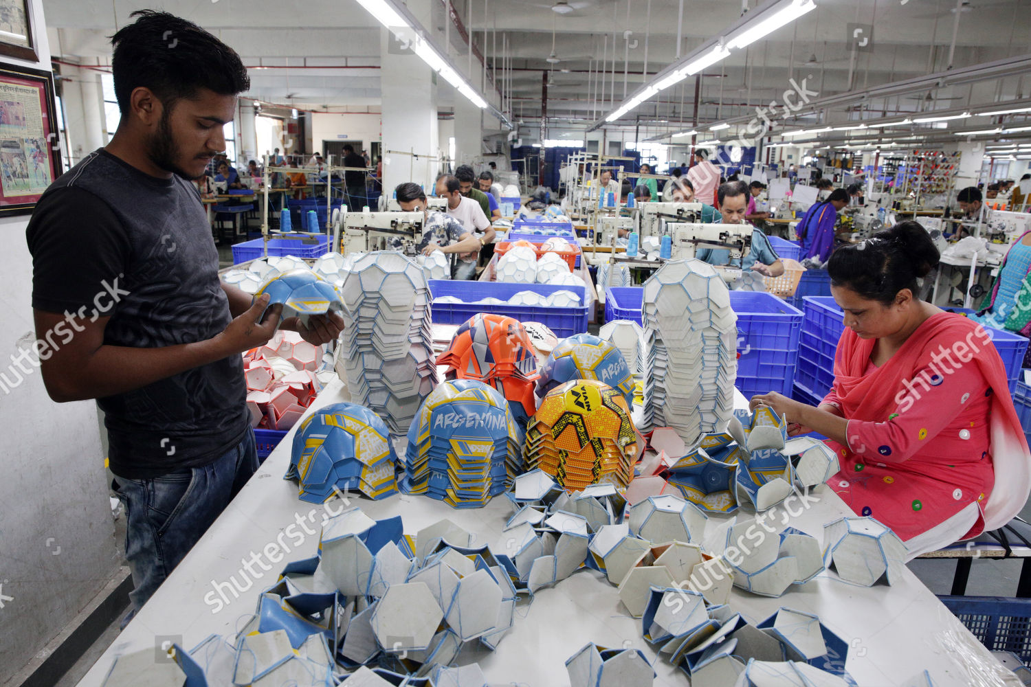 Indian Workers Work On Manufacturing Footballs Editorial Stock Photo