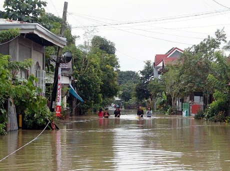 Filipino Residents Wade Along Street Flooded Editorial Stock Photo ...