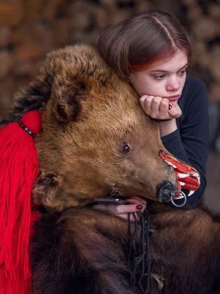 YOUNG WOMAN DRESSED HER BEAR SKIN Editorial Stock Photo - Stock Image ...