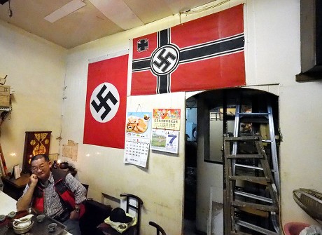 Nazi swastika flags in a Taiwan betel nut shop cause controversy, Taipei - 07 Jan 2019