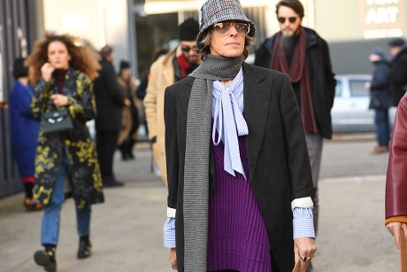 MILAN, ITALY - JANUARY 13, 2019: Woman with Louis Vuitton gray jacket with  logo relief before Reshake fashion show, Milan Fashion Week street style  Stock Photo - Alamy