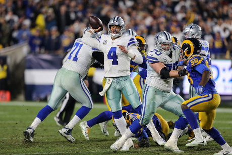 Los Angeles, CA, USA. 12th Jan, 2019. Los Angeles Rams running back C.J.  Anderson (35) breaking away from Dallas Cowboys cornerback Chidobe Awuzie  (24)during the NFL Divisional Playoffs game between Dallas Cowboys