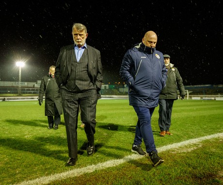 Cowdenbeath Chairman Donald Findlay & Cowdenbeath Manager Gary Bollan walk on the pitch shortly after Cowdenbeath's William Hill Scottish Cup 4th Round tie against Rangers. The match was postponed due to a frozen pitch.