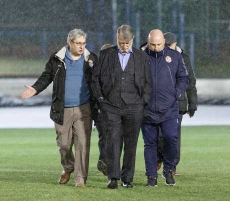 Cowdenbeath club Chairman Donald Findlay QC (centre) & Cowdenbeath Manager Gary Bollan walk on the pitch at Central Park shortly after Cowdenbeath's William Hill Scottish Cup 4th Round tie against Rangers. The match was postponed due to a frozen pitch.