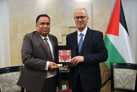 Palestinian Prime Minister, Rami Hamdallah, meets with Ambassador of Uruguay to Palestinian Territories Jorge Cassinelli, West Bank city of Ramallah - 21 Feb 2019