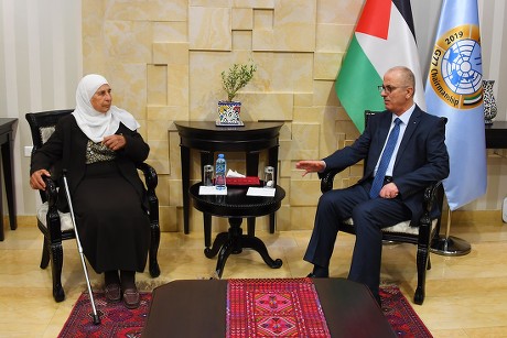 Former Palestinian Prime Minister, Rami Hamdallah, meets with the family of the prisoner Maher Younes, in the West Bank city, Ramallah - 10 Mar 2019