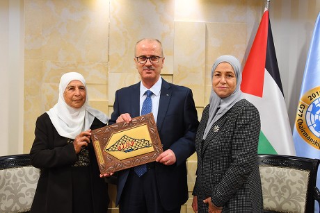 Former Palestinian Prime Minister, Rami Hamdallah, meets with the family of the prisoner Maher Younes, in the West Bank city, Ramallah - 10 Mar 2019