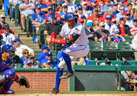 Mar 28, 2019: Chicago Cubs shortstop Javier Baez #9 during an Opening Day  MLB game between the Chicago Cubs and the Texas Rangers at Globe Life Park  in Arlington, TX Chicago defeated