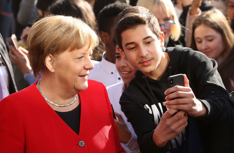 Merkel visits school to discuss European Union topics, Berlin, Germany - 02 Apr 2019