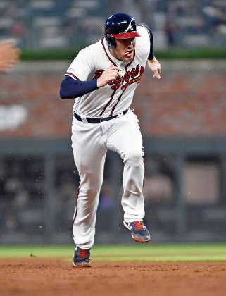 News Photo : Dansby Swanson of the Atlanta Braves watches the