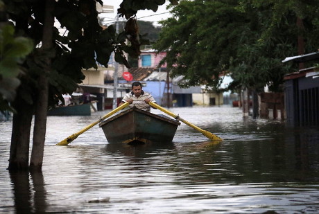 Man Navigates Through Flooded Neighborhood Asuncion Editorial Stock ...