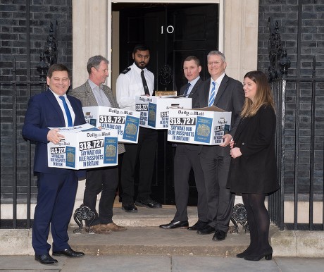 L-r Andrew Brigden Mp Nigel Evans Mp David Churchill Daily Mail Reporter Andrew Rosindell Mp And Eleanor Hayward Daily Mail Reporter Hand Over Boxes Of 318 727 Signatures To 'make Blue Passports In Britain' At Number 10 Downing Street.