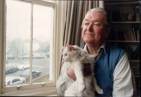 Author Kingsley Amis (1922-1995) At Home With His Cat.