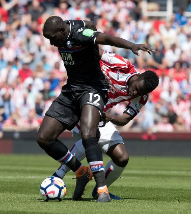 Football: Premier League: Stoke City 1 Crystal Palace 2. Stoke Are Relegated. May 5th 2018 - Stoke Uk - Stoke V Crystal Palace - Stoke's Mame Diouf And Crystal Palace's Mamadou Sakho Picture By Ian Hodgson/daily Mail.