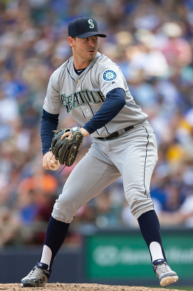 Seattle Mariners reliever Matthew Festa delivers a pitch during a