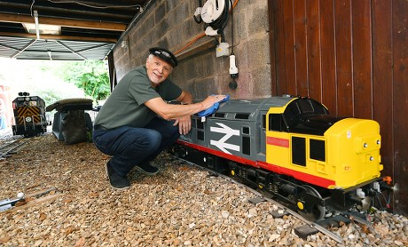 Steve Bates, who has built a miniature steam railway in his back garden, Waddington, Lincolnshire, UK - 20 Jun 2019