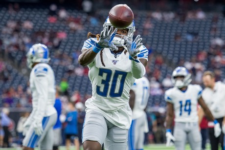 August 17, 2019: Detroit Lions running back Kerryon Johnson (33) prior to  an NFL football pre-season game between the Detroit Lions and the Houston  Texans at NRG Stadium in Houston, TX. ..Trask