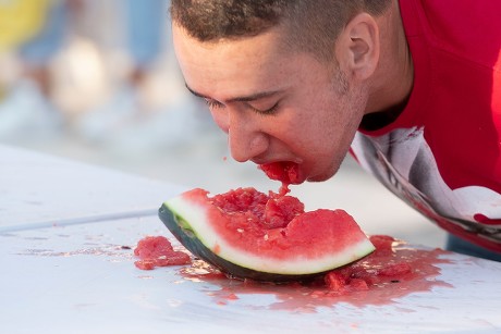 International Watermelon Eating Contest Sponrored By Editorial Stock ...