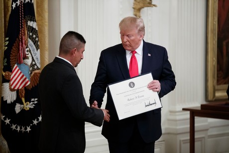 US President Donald J. Trump presents the Medal of Valor and Heroic Commendations to Dayton Police Officers and El Paso citizens, Washington, USA - 09 Sep 2019