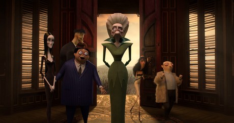 Morticia Addams (Charlize Theron), Lurch (Conrad Vernon), Gomez Addams (Oscar Isaac) and Great Auntie Sloom (Jennifer Lewis)