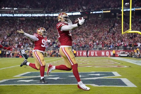 Santa Clara, CA. 16th Dec, 2018. San Francisco 49ers defensive tackle DeForest  Buckner (99) isa able to drag down Seattle Seahawks quarterback Russell  Wilson (3) during the NFL football game between the