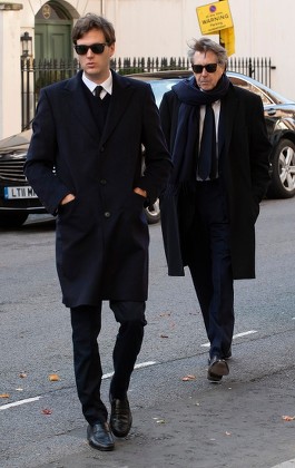 Bryan Ferry With One Of His Sons Attends The Memorial Service Of His Socialite / Model Ex-wife Lucy Birley (ferry) At Farm Street Church In Mayfair.