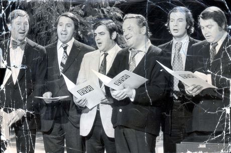 Newsreader Sandy Gall Sandy Gall With Fellow Itn Employees L To R: Leonard Parkin Robert Southgate Reginald Bosanquet Rory Macpherson And Ivor Mills. They Are All Singing Christmas Carols For London Weekend Television In A Programme Screened Over Chr