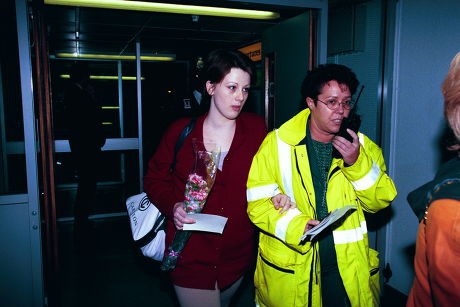 Sally Griffiths (red Jacket) And Claire Martin (beige Sweater) Arriving At Heathrow Airport - 1999