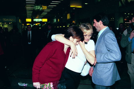 Sally Griffiths (red Jacket) And Claire Martin (beige Sweater) Arriving At Heathrow Airport - 1999