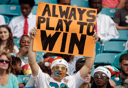 Miami Gardens, Florida, USA. 22nd Dec, 2019. The Miami Dolphins  cheerleaders share the Christmas spirit as they perform during an NFL  football game between the Miami Dolphins and the Cincinnati Bengals at