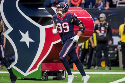 Houston Texans defensive end J.J. Watt (99) warms up before an NFL  wild-card playoff football game against the Buffalo Bills Saturday, Jan. 4,  2020, in Houston. (AP Photo/Eric Christian Smith Stock Photo 