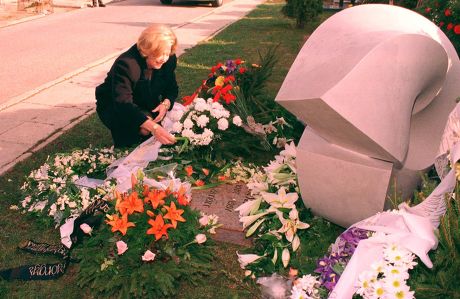 Maestro Solti's Ashes Buried In His Native Hungary ... Maestro Sir Georg Solti's Widow Lady Valerie Places Flowers On The Tomb Of The Hungarian-born Conductor In Farkasreti Cemetery In Budapest March 29. Solti's Ashes Were Later Interred In A Plot