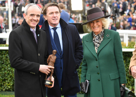 Ruby Walsh (left) and Tony McCoy with Camilla Duchess of Cornwall as she attends Ladies Day at the Cheltenham Festival