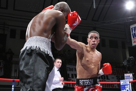Ahmet Patterson (red/white shorts) defeats Jason Nesbitt in a Welterweight boxing contest at York Hall, Bethnal Green, promoted by Frank Warren