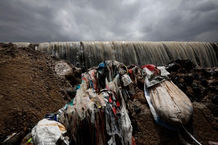 Flooded Stream Rainwater Littered Waste Following Editorial Stock Photo ...