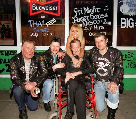 Fifties Rock & Roller Heinz Burt Now Confined To A Wheelchair With Motor Neurone Disease At A Benefit Given In His Honour At The Lord Nelson Pub In Holloway North London. (l-r) Bob Gibbons Johny Marmara Kim Roberts And William Musyk Alias Rocker Bill