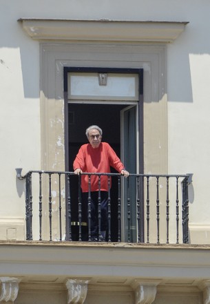 Emilio Fede out on his balcony, Naples, Italy - 24 Jun 2020