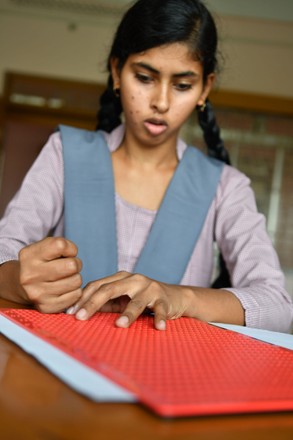 Blind girls using Braille, Agartala, Tripura, India - 14 Mar 2018 Stock