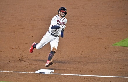 Dansby Swanson of the Atlanta Braves rounds the bases after