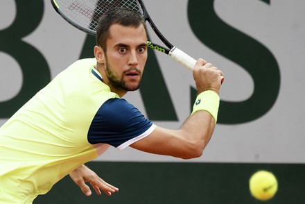 Laslo Dere of Serbia eyes the ball during his first round match against Kevin Anderson of South Africa the French Open tennis tournament at Roland Garros in Paris, France, 29 September 2020.