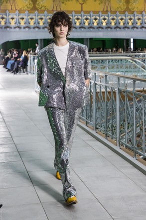A model wears a creation by French designer Louis Vuitton as part