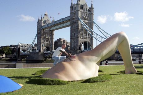 Tattooist Louis Malloy Unveils A New London Landmark Of A Man Swimming Through A Concrete At Potters Field Se1 And Puts The Finishing Touches To A Tattoo On Its Back Tattoo Artist Louis Malloy Today Unveiled An Unusual New Landmark Near City Hall. Th