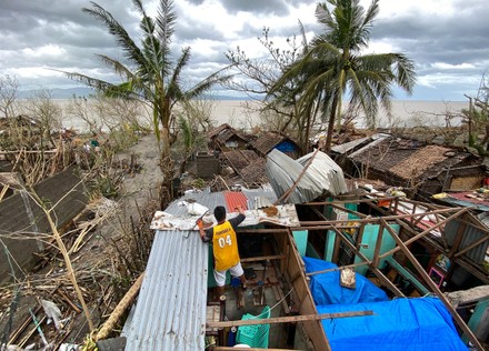 FILIPINO VILLAGER REPAIRS DAMAGED HOME TYPHOON-HIT Editorial Stock ...