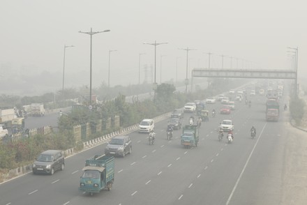 Vehicles On Burari Road On Smogy Editorial Stock Photo - Stock Image
