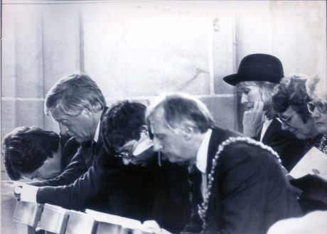 Russell Harty Memorial Service -blackbrow Cathedral-michael Parkinson (l) With Wife Mary (behind With Hat) During Prayers....television Presenter (1980 -1989) 1987