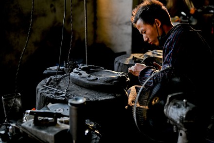 A 23-year-old man from Guizhou province has inherited the skills of Four thousand years of Sizhou Shiyan, Qiandongnan, China - 14 Nov 2020